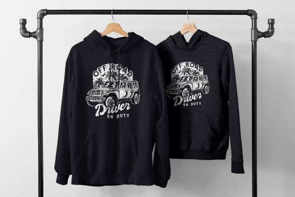 "Driveronduty Hoodie with front pouch pocket and stitched eyelets, featuring off-road design hanging on a rack."