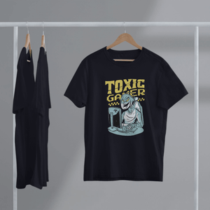 Black Toxic Gamer Tshirt on a hanger, featuring a graphic design on 100% Airlume combed cotton material.